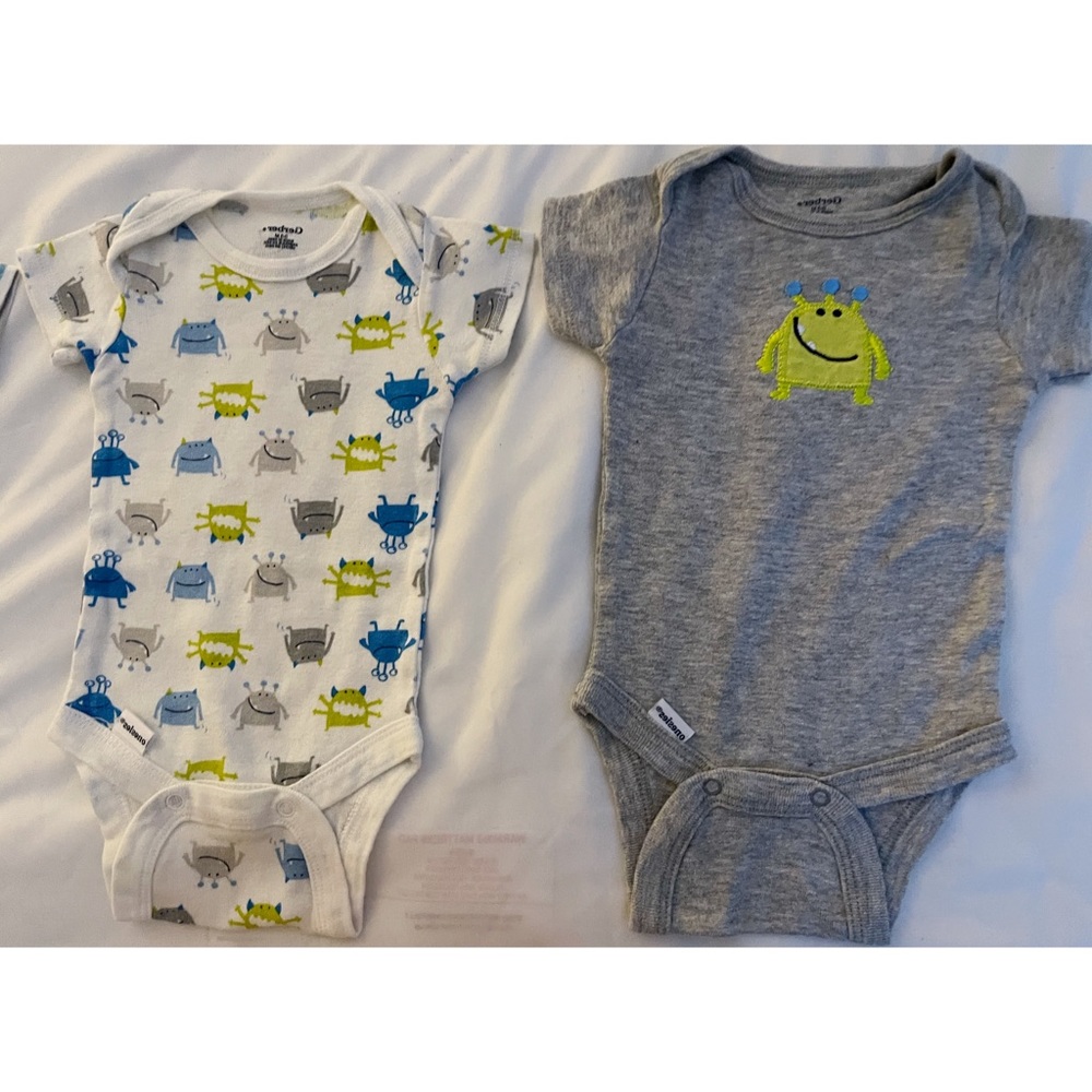 Four onesies with no marks or flaws.
